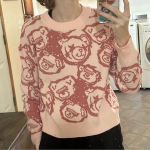 pink long sleever sweater with cute bear design